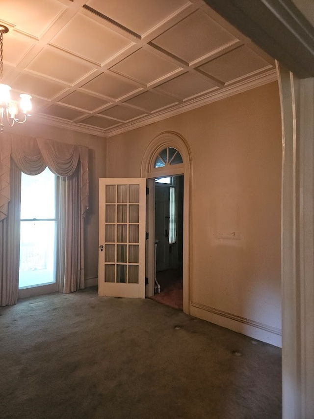 446 Pennsylvania Ave, Waverly, NY 14892 - spare room featuring a chandelier and carpet