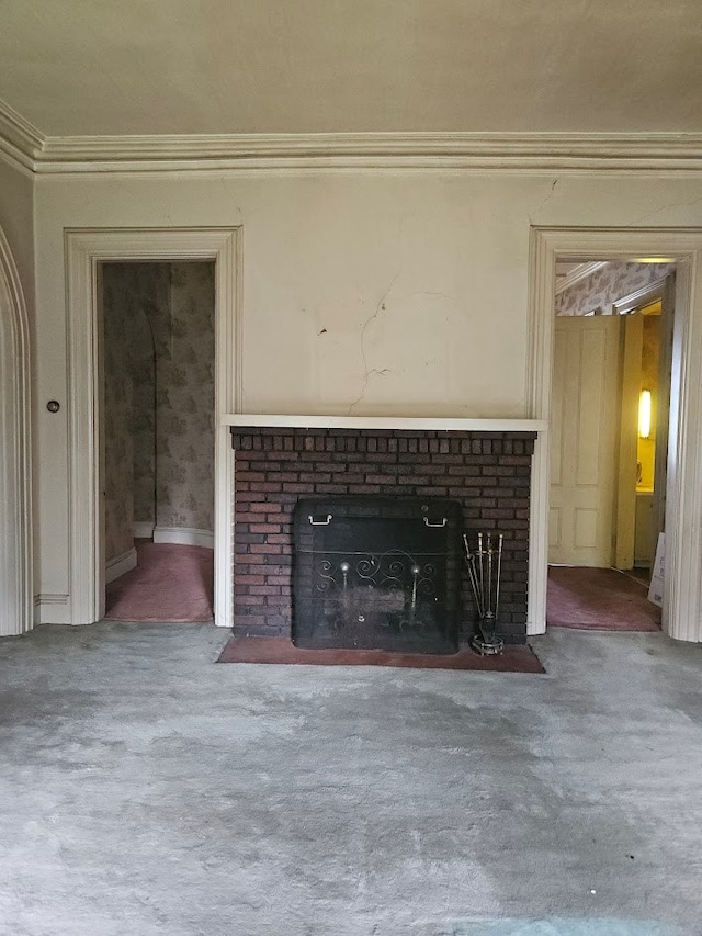 446 Pennsylvania Ave, Waverly, NY 14892 - unfurnished living room with a brick fireplace, carpet floors, and ornamental molding
