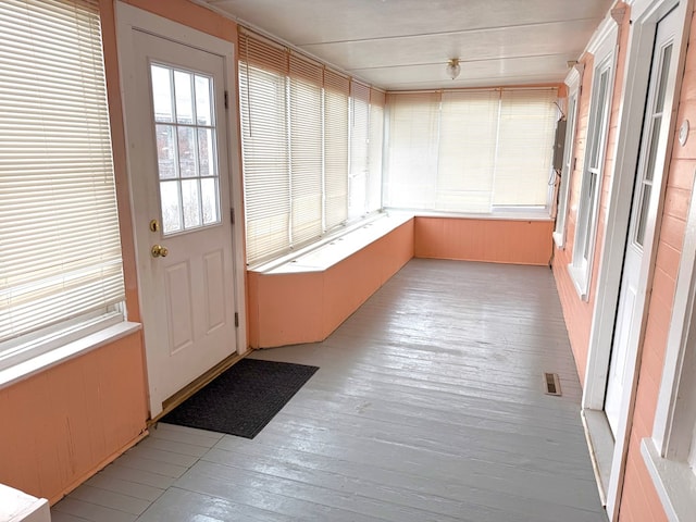 sunroom with a healthy amount of sunlight