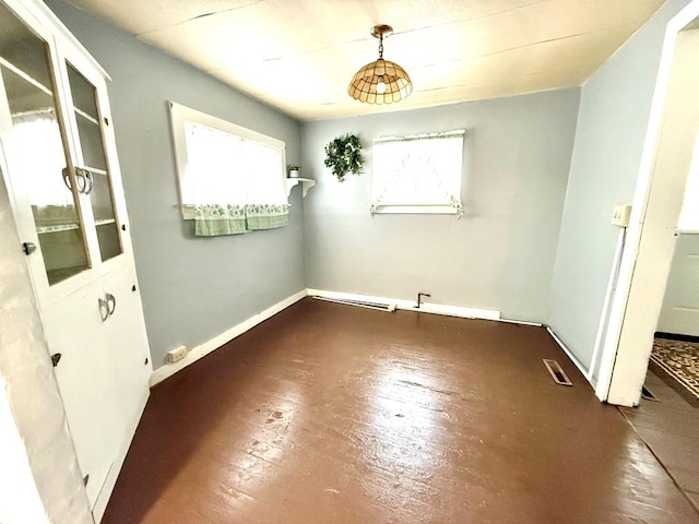 empty room featuring a wealth of natural light