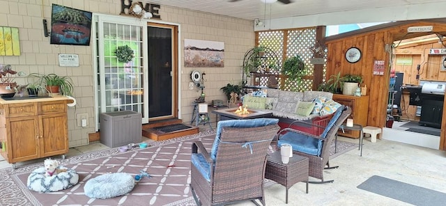 607 N W St, Coudersport, PA 16915 - view of patio / terrace with a ceiling fan and an outdoor living space with a fire pit
