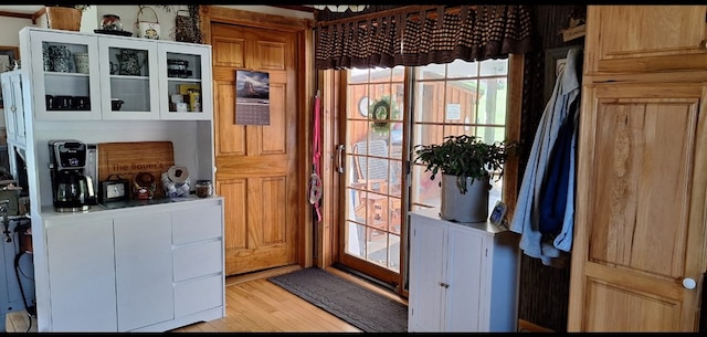 607 N W St, Coudersport, PA 16915 - doorway to outside featuring light wood-style floors and healthy amount of natural light