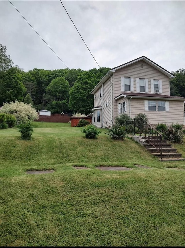 607 N W St, Coudersport, PA 16915 - view of side of property featuring a lawn