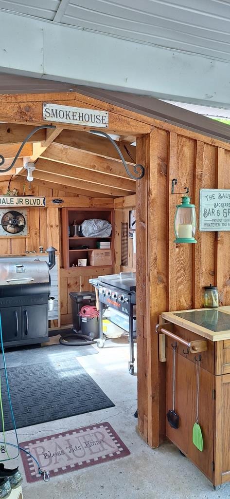 607 N W St, Coudersport, PA 16915 - garage featuring wood walls