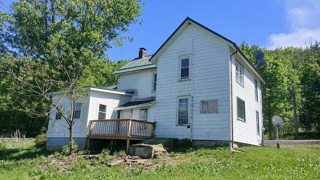 2323 Cotton Hollow Rd, Athens, PA 18810 - rear view of property featuring a chimney, a deck, and metal roof