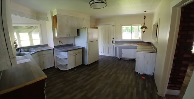 2323 Cotton Hollow Rd, Athens, PA 18810 - kitchen featuring freestanding refrigerator, a sink, healthy amount of natural light, and dark wood finished floors