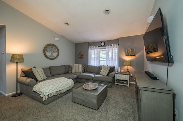 carpeted living room with lofted ceiling