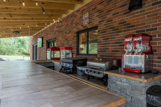 view of patio / terrace featuring area for grilling and exterior kitchen