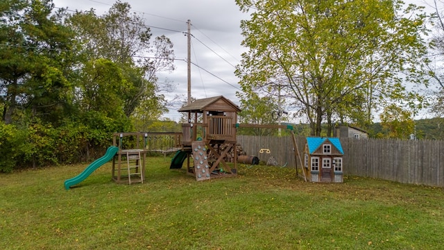 view of jungle gym featuring a lawn