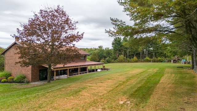 view of yard featuring a playground