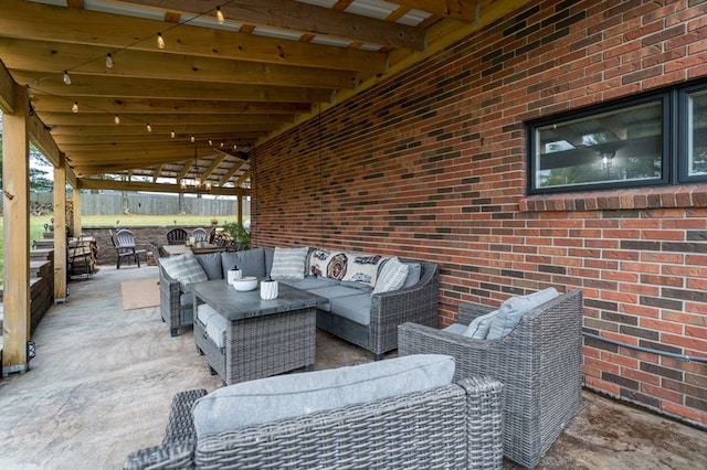 view of patio with ceiling fan and an outdoor hangout area