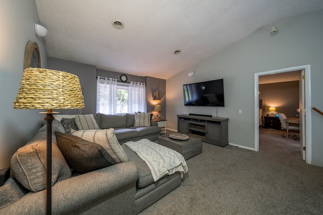 living room with carpet, a textured ceiling, and lofted ceiling