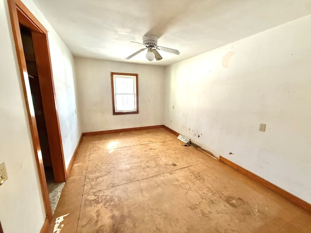 spare room with ceiling fan