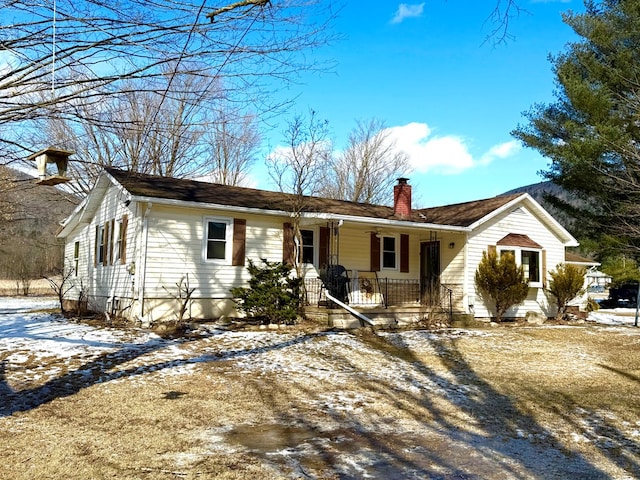 single story home with covered porch