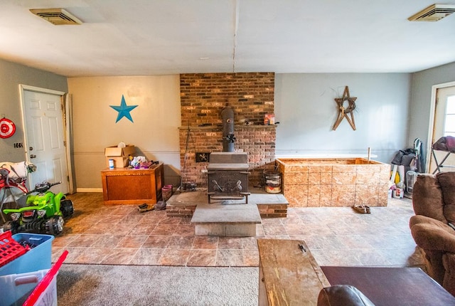 145 Tracy Brewer Rd, Meshoppen, PA 18630 - living room featuring a wood stove