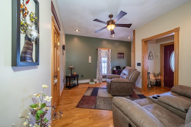 208 S St, Athens, PA 18810 - living room with recessed lighting, a baseboard heating unit, ceiling fan, light wood finished floors, and baseboards