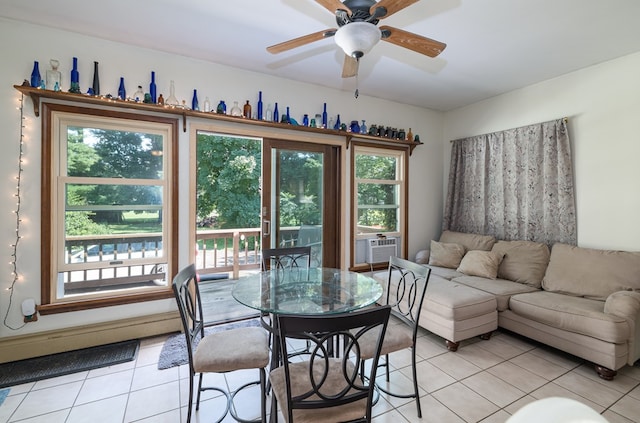 tiled dining room featuring ceiling fan and cooling unit