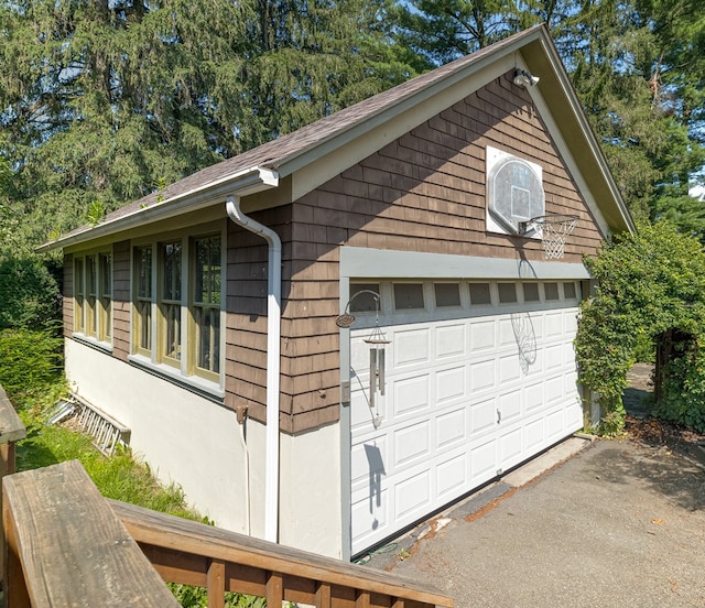 view of property exterior with a garage