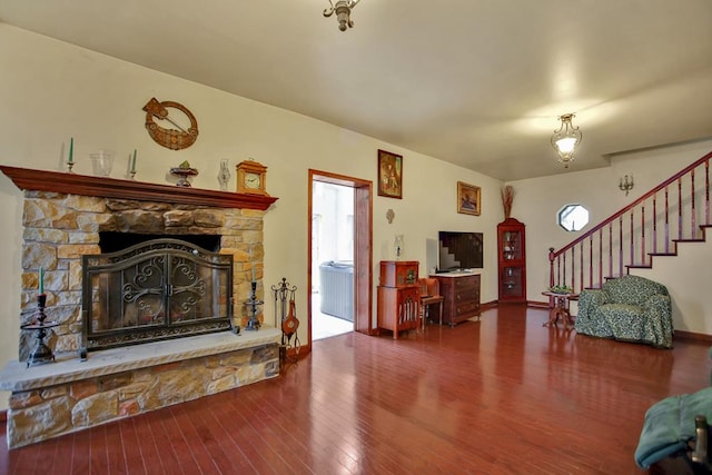 living room featuring hardwood / wood-style floors and a fireplace