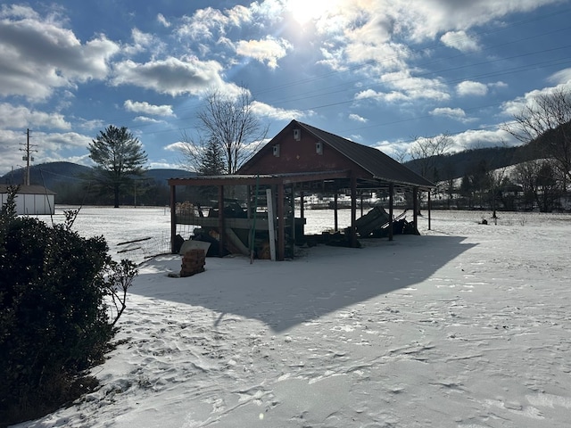 view of dock featuring a mountain view