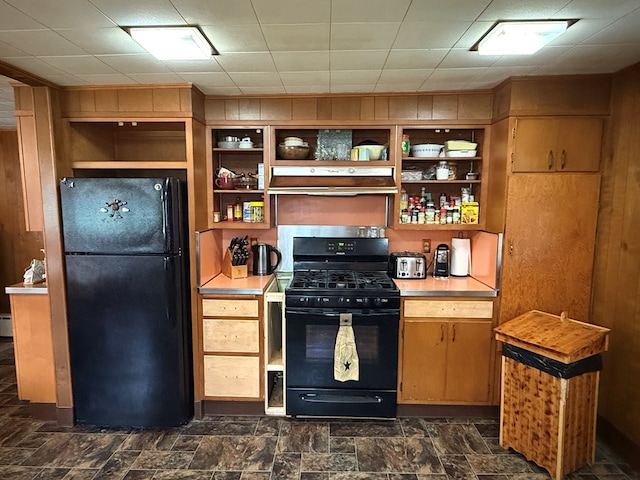 213 2nd St, Harrison Valley, PA 16927 - kitchen featuring black appliances, under cabinet range hood, open shelves, light countertops, and wood walls