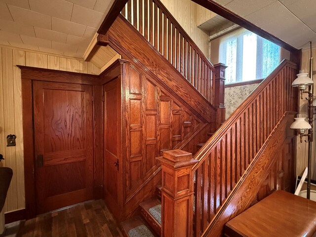 213 2nd St, Harrison Valley, PA 16927 - staircase featuring wood finished floors and wood walls