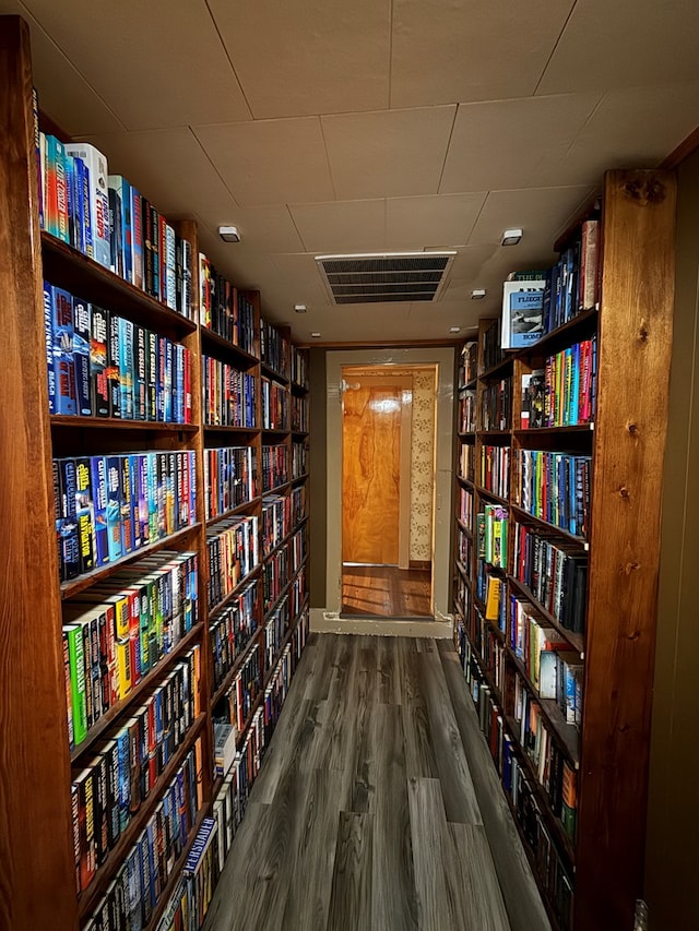 213 2nd St, Harrison Valley, PA 16927 - unfurnished room with bookshelves and wood finished floors