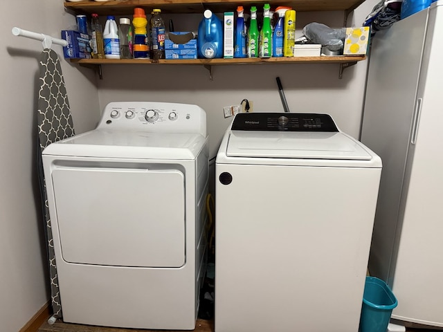 213 2nd St, Harrison Valley, PA 16927 - laundry room with washing machine and clothes dryer and water heater