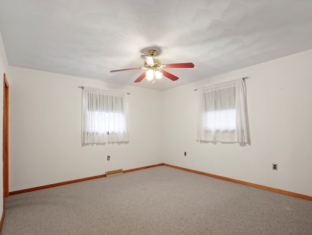 113 Hemlock Rd, Sayre, PA 18840 - spare room with a ceiling fan, carpet, and baseboards