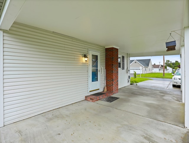 113 Hemlock Rd, Sayre, PA 18840 - view of patio / terrace with a residential view and a carport