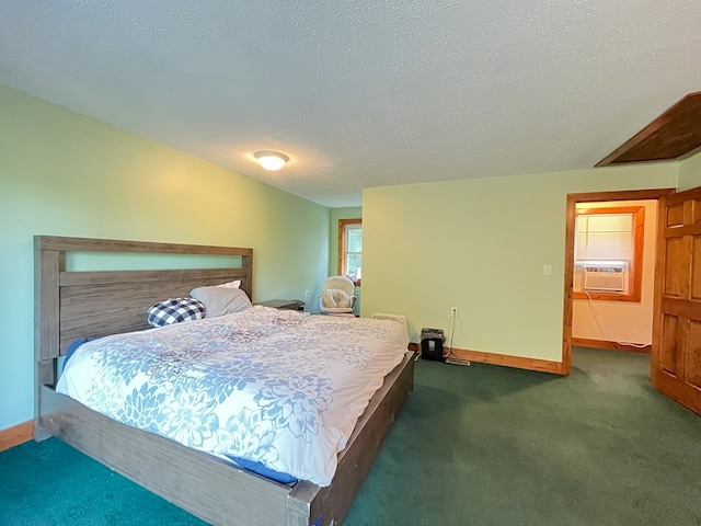 carpeted bedroom with cooling unit and a textured ceiling