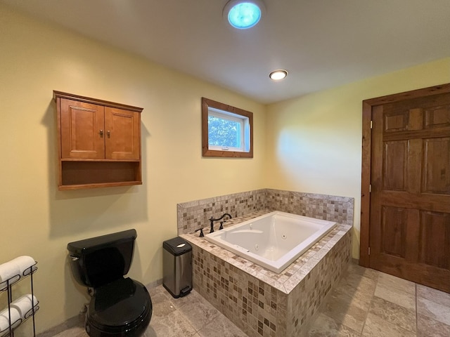 bathroom with a relaxing tiled tub and toilet