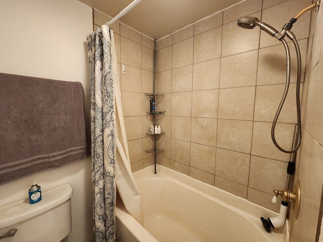 bathroom with toilet and shower / tub combo with curtain