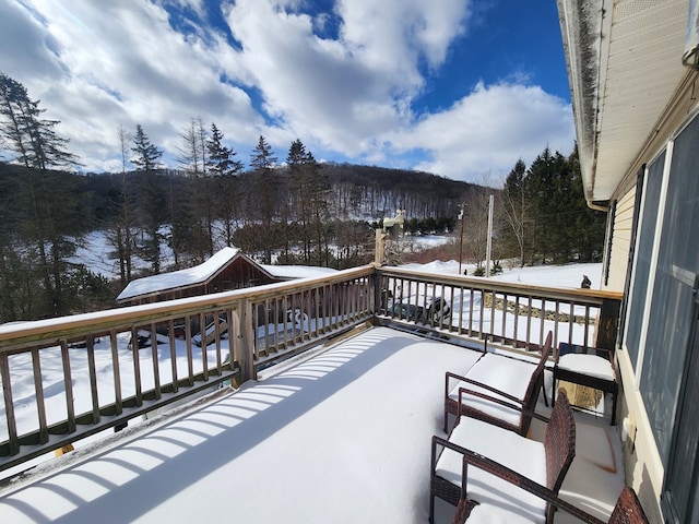 view of snow covered deck