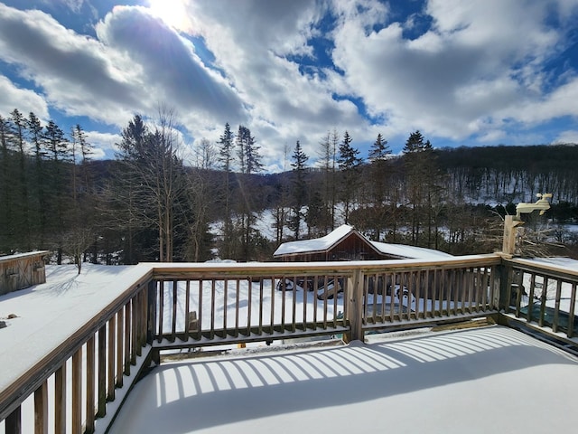 view of snow covered deck