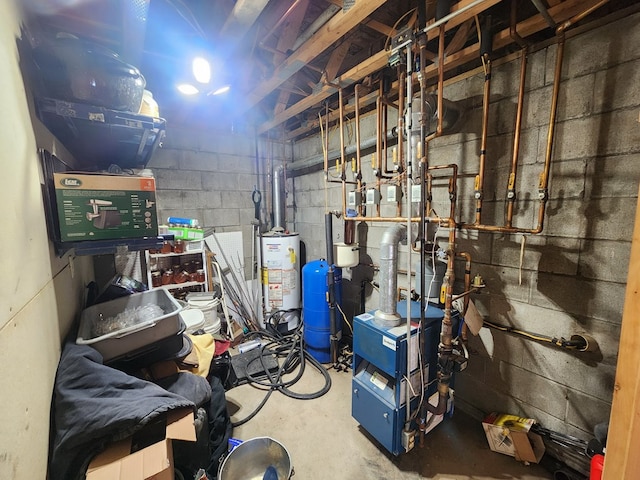 utility room featuring water heater and a heating unit