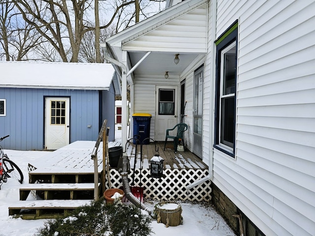 view of snow covered deck