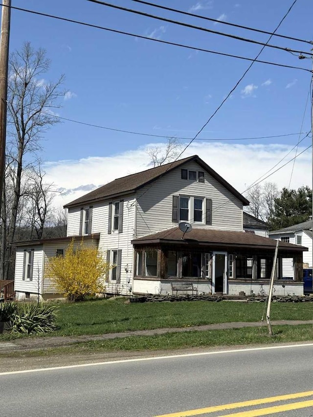 408 W Honeoye St, Shinglehouse, PA 16748 - view of front facade featuring a front lawn and a shingled roof