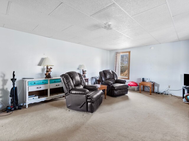 carpeted bedroom featuring a wall mounted AC