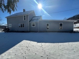 view of snow covered property