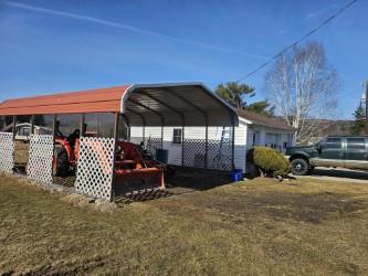 exterior space with a detached carport