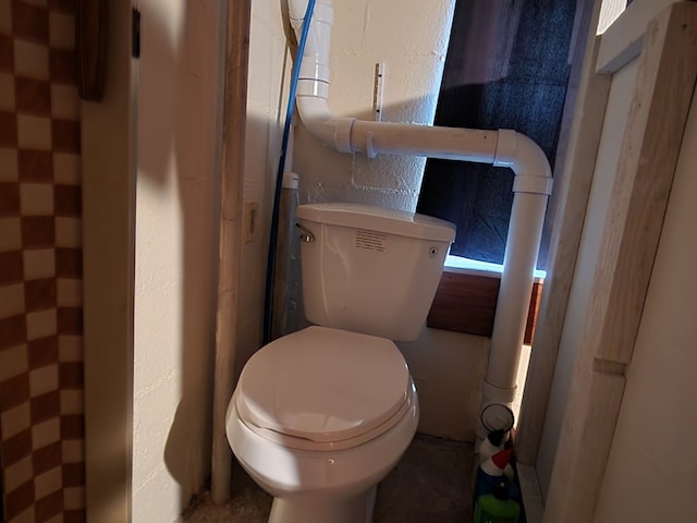 bathroom featuring toilet