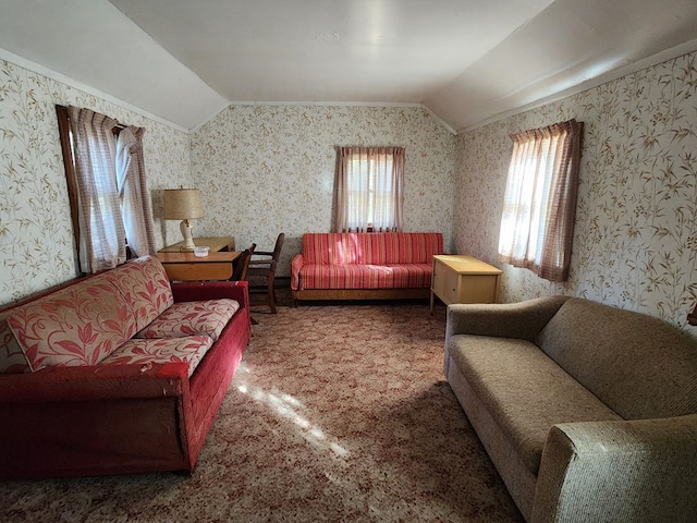 carpeted living room featuring vaulted ceiling