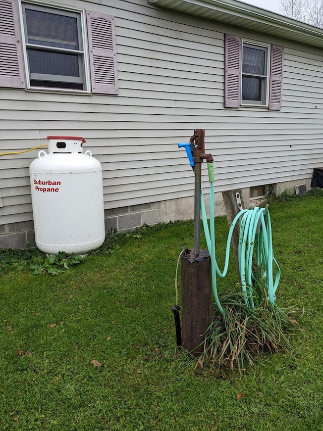 2703 Phoenix Run Rd, Sabinsville, PA 16943 - view of home's exterior featuring a lawn and crawl space