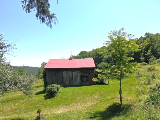 971 Indian Creek Rd, Eldred, PA 16731 - view of grassy yard featuring an outdoor structure