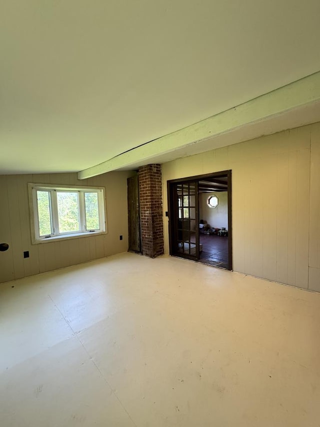 971 Indian Creek Rd, Eldred, PA 16731 - empty room with wooden walls and concrete floors