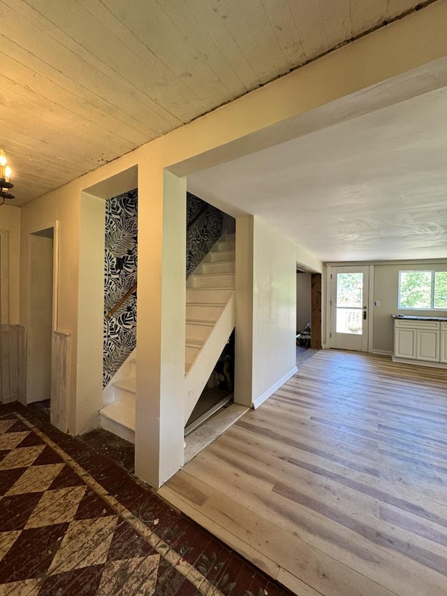 971 Indian Creek Rd, Eldred, PA 16731 - unfurnished living room with stairs, wood finished floors, and wooden ceiling