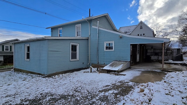 view of snow covered property