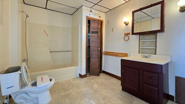 full bathroom featuring bathtub / shower combination, vanity, and toilet