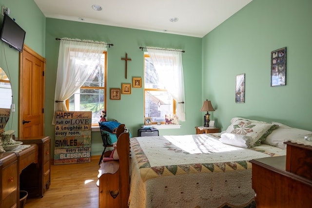 bedroom with light wood-type flooring